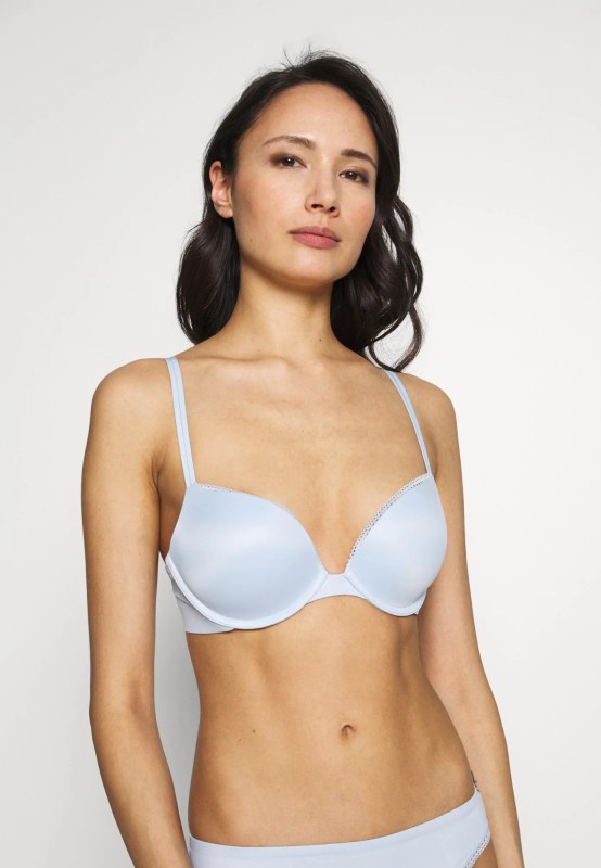 Podprsenka pushup model 8397767 modrá - Calvin Klein - Doplňky čepice, rukavice a&nbsp;šály