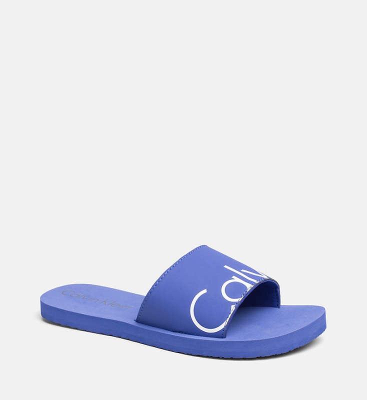 Pantofle model 5913347 modrá - Calvin Klein - Doplňky čepice, rukavice a šály